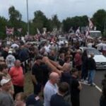 Large crowd gathers in the UK to protest housing of asylum seekers in local hotels